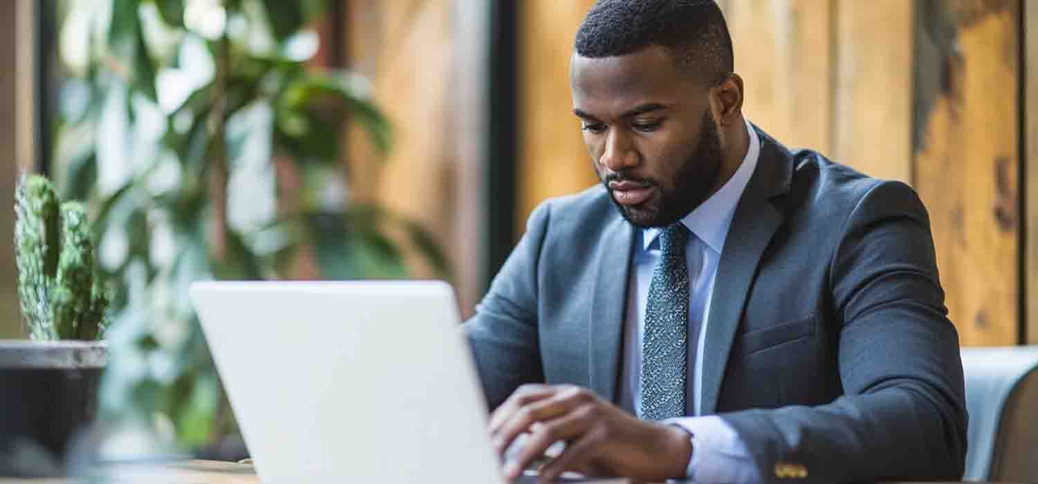 IT security expert updating software to protect sensitive business data