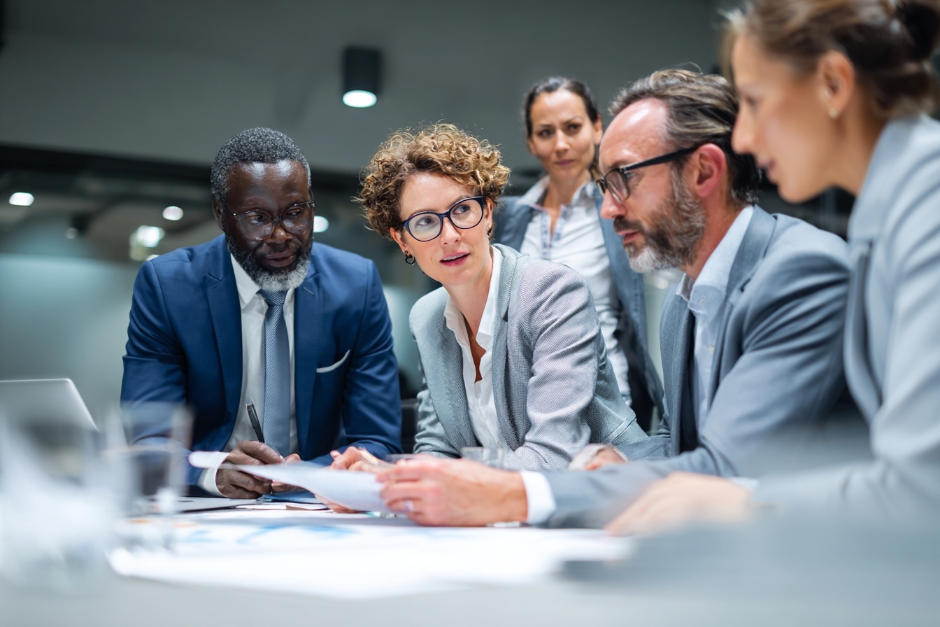 Diverse professionals discussing business continuity planning